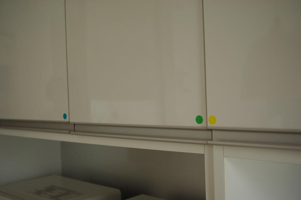 Cabinets and mail pockets are color-coded. 
