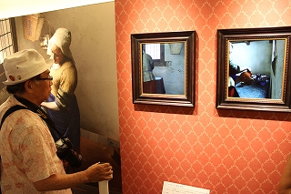 A model produced using a 3D printer enables a person to view areas not shown in the original picture of Johannes Vermeer’s The Milkmaid.