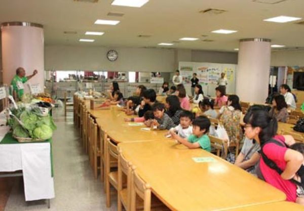 Japanese children listening about vegetables in season